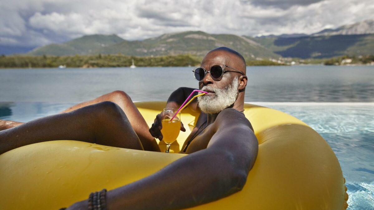 Older man relaxing in an inflatable ring