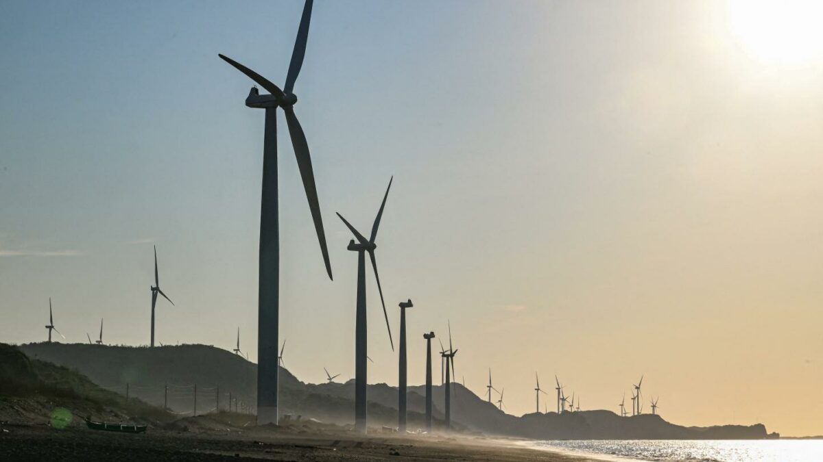 Wind turbines are pictured along the shore in Bangui in the northern Philippines province of Ilocos Norte on May 6, 2026.