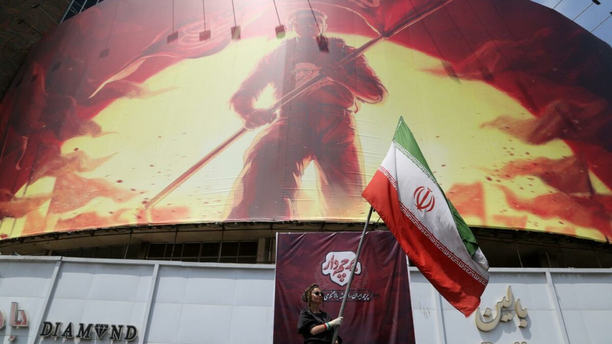 Waving the Iranian flag in Tehran, Aug. 6, 2026.