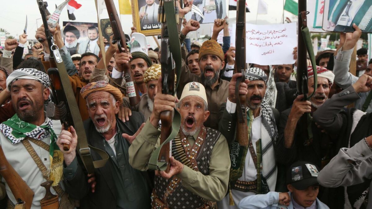 Yemeni protesters brandish weapons and shout slogans during a protest staged against the continued Saudi-led blockade on Yemen on July 31, 2026 in Sana'a, Yemen.